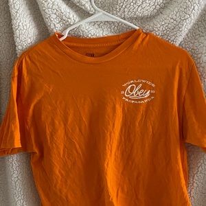 Orange obey crop